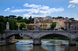 Bridge with a city in the background.