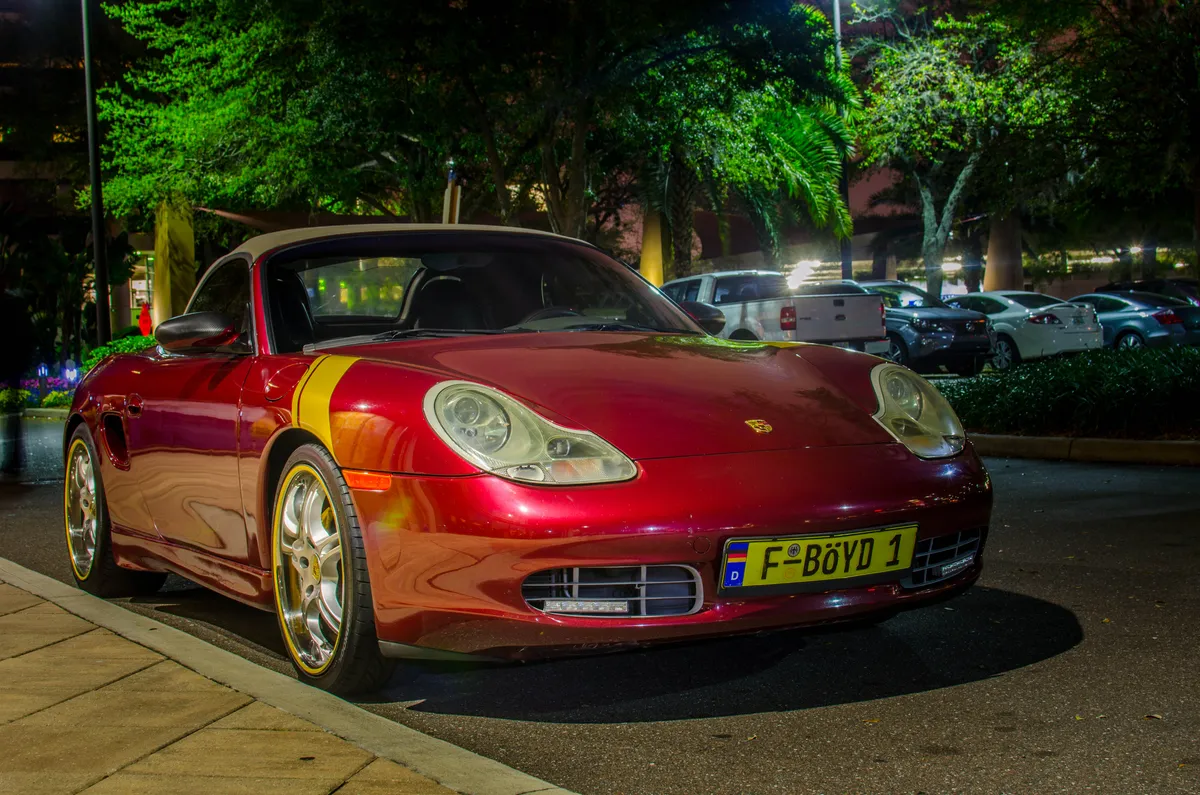 Porsche in a parking lot.